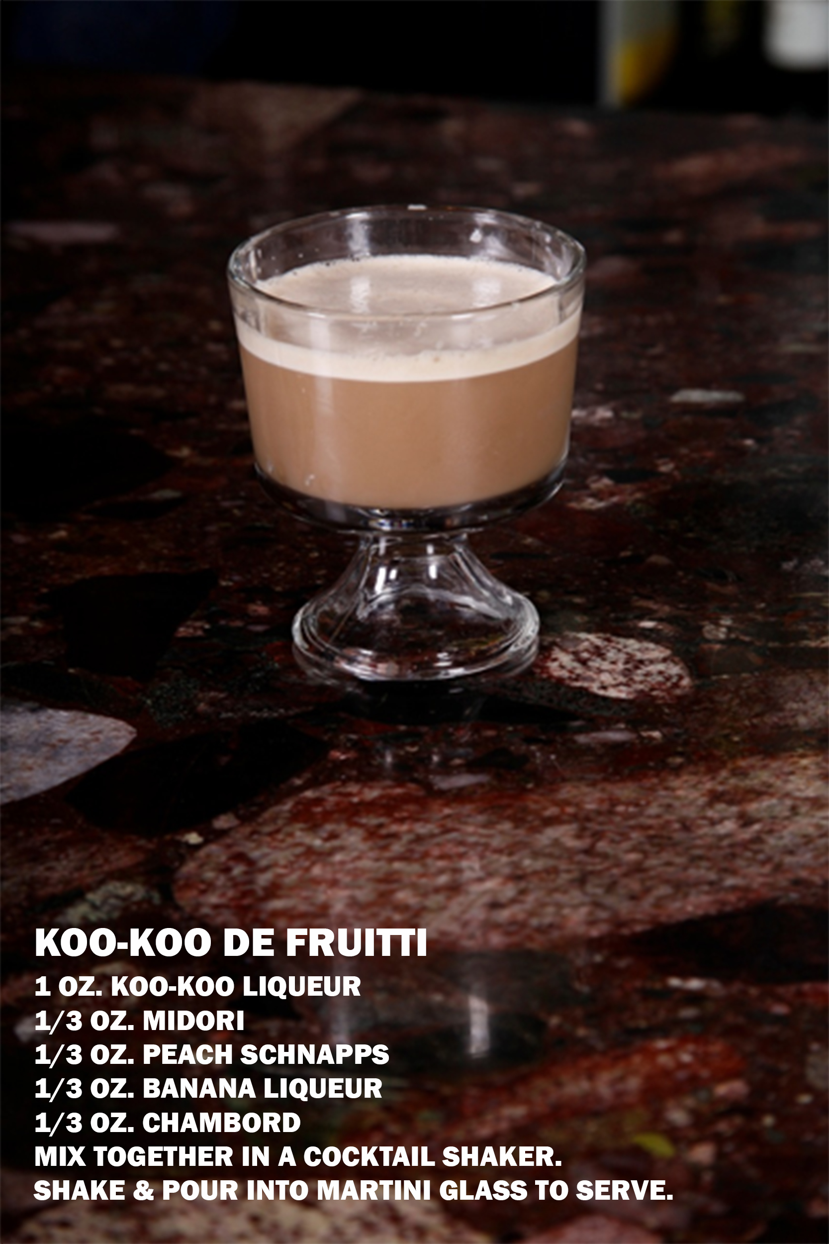 A highball glass filled with the vibrant Koo Koo de Fruitti